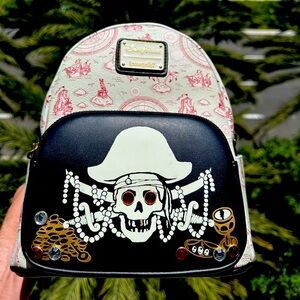 Loungefly Disney Parks Pirates of the Caribbean AOP Glow in the Dark Backpack